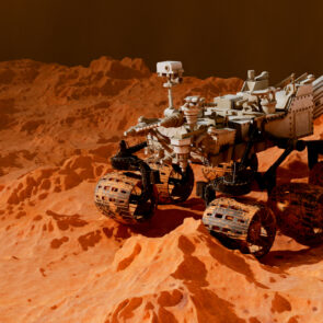 Mars rover on a planet's surface.