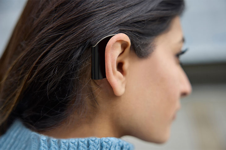 Hearing Device on a Woman's Ear