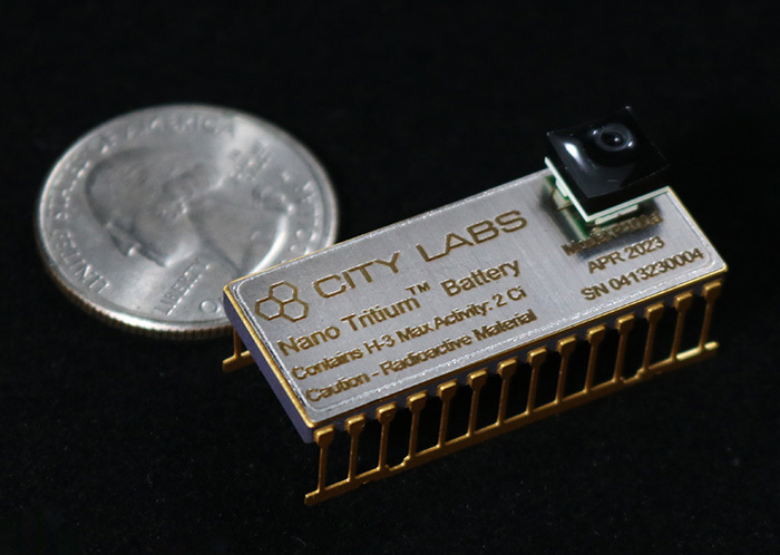 powering NASA space exploration, City Labs Nanotritium ™ Batteries, image of P100 battery next to a quarter for scale