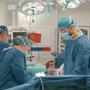 Doctors focused on surgery implanting pacemaker powered by nanotritium batteries